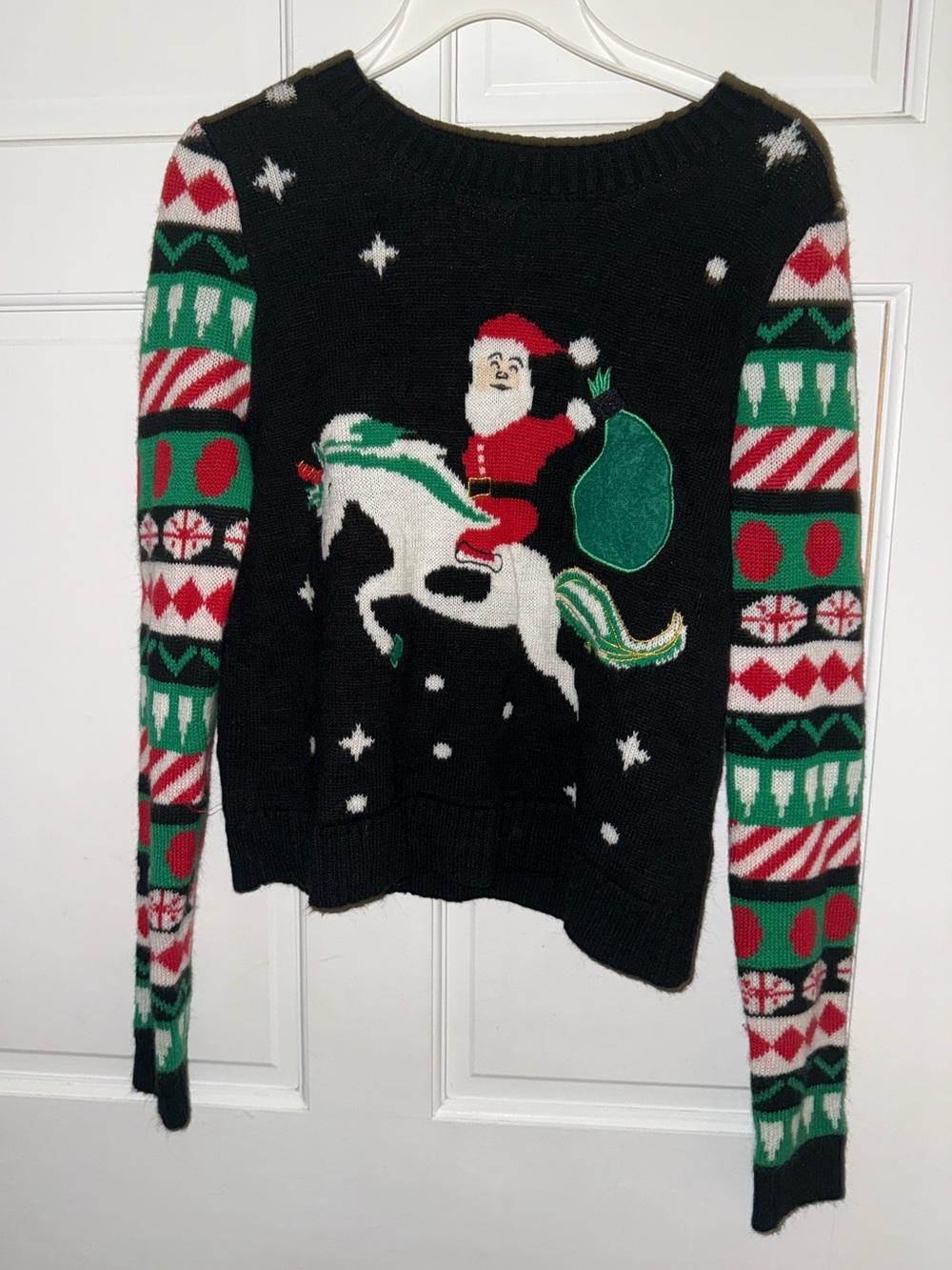 Black Holiday Santa Riding Unicorn Sweater with Red & Green Accents